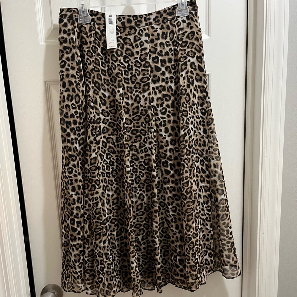 Chico’s long pleated leopard print skirt. Size 0. NWT.